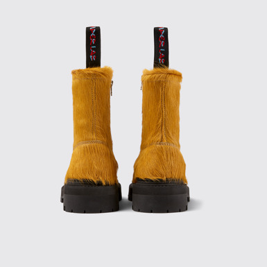 Back view of Eki Dark yellow long calf hairboots