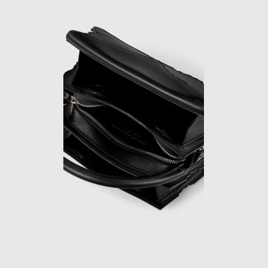 Overhead view of CAMPERLAB BAGS Black leather accordion shoulder bag