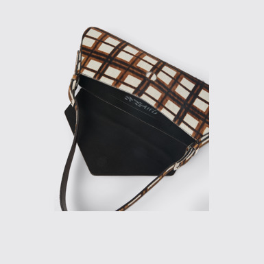 Overhead view of CAMPERLAB BAGS Cream-brown tartan hair-on-leather handbag