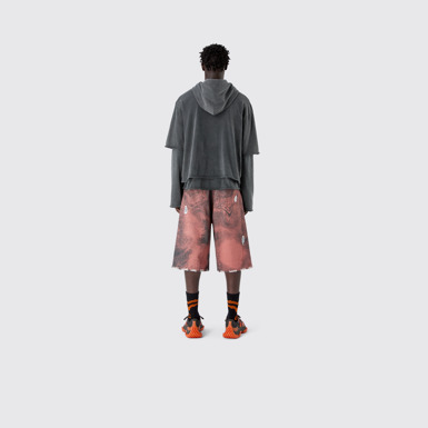 DISTORTED PRINT DISTRESSED DENIM SHORTS