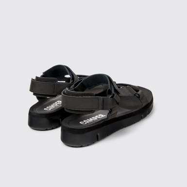 Back view of Oruga Black leather sandals for men