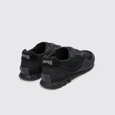 Back view of Nothing Black men’s sneaker