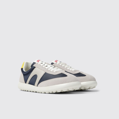 Front view of Pelotas XLite Blue, grey, and yellow sneakers for men