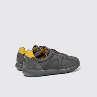 Back view of Pelotas XLite Gray and yellow sneakers for men