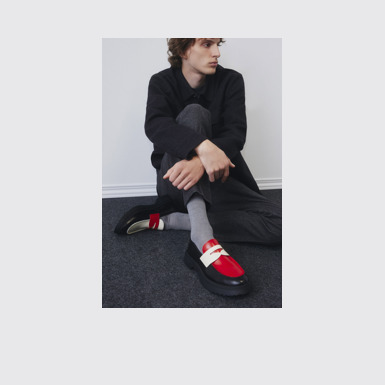A model wearing Twins Multicolor Leather Moccasin/Nautical Shoes for Men.