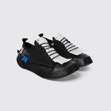 Front view of ADERERROR Black sneakers