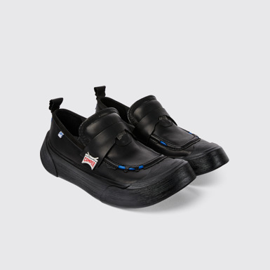 Front view of ADERERROR Black leather shoes