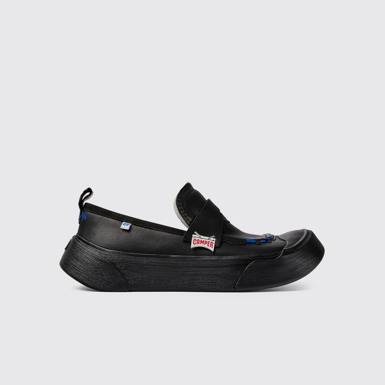 Side view of ADERERROR Black leather shoes