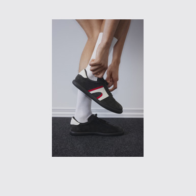 A model wearing Pelotas Soller Multicolor Nubuck and Leather Sneakers for Men.