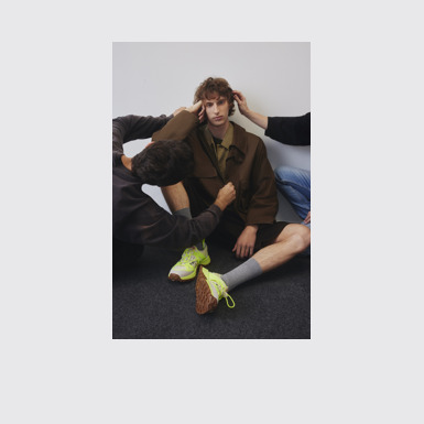 A model wearing Drift Trail VIBRAM Multicolor Recycled PET and Nubuck Sneakers for Men.