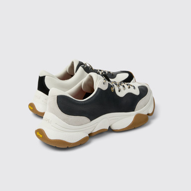 Twins Sneakers de piel blancas y negras para hombre.