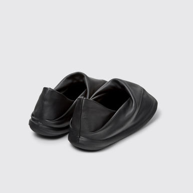 Back view of Camper x ISSEY MIYAKE - Peu Form Black Leather Shoes for Men.