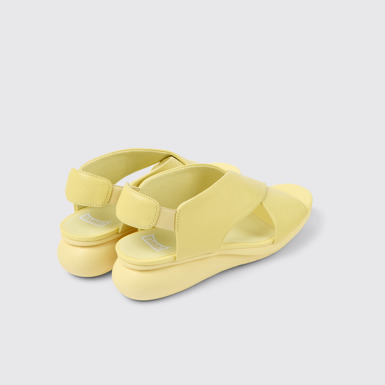 Back view of Balloon Yellow leather sandals for women
