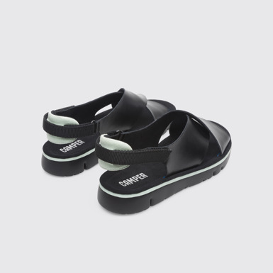 Back view of Oruga Black Sandals for Women
