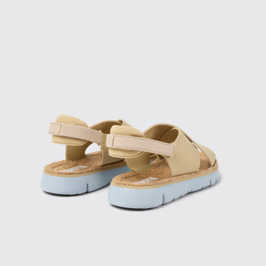 Back view of Oruga Beige leather and textile sandals for women