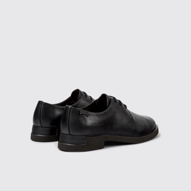 Back view of Iman Black Leather Shoes for Women.