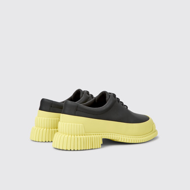 Back view of Pix Black and yellow leather lace-up shoes for women