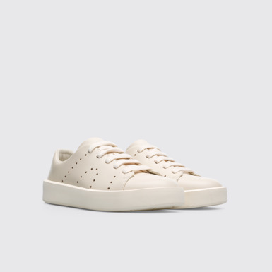 Front view of Courb Cream women's sneaker