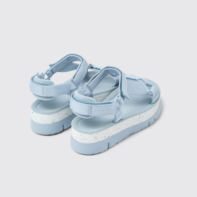 Back view of Oruga Up Blue textile sandals for women