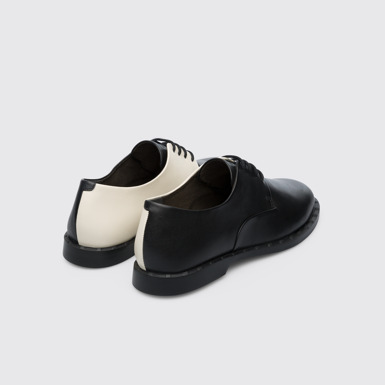 Back view of Twins Women’s black and cream color lace-up shoe