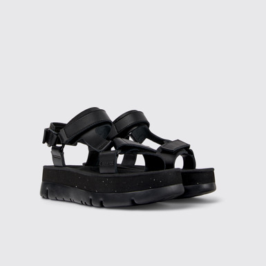 Front view of Oruga Up Black leather sandals for women
