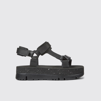 Side view of Oruga Up Black leather sandals for women