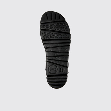 The sole of Oruga Up Black leather sandals for women