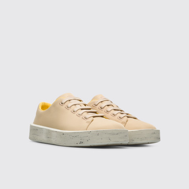 Front view of Courb Beige sneaker for women