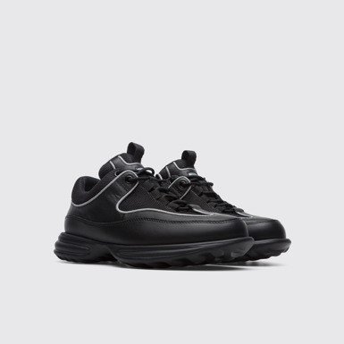 Front view of Pop Trading Company Black women's sneaker