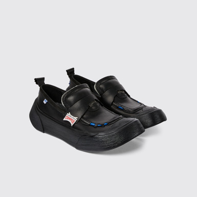 Front view of ADERERROR Black leather shoes