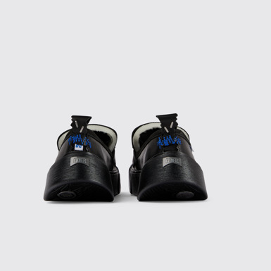 Back view of ADERERROR Black leather shoes