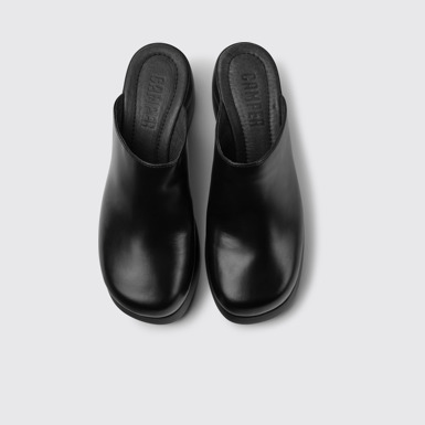 Overhead view of Kaah Black leather clogs
