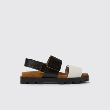 Side view of Brutus Sandal Black and white leather sandals for women