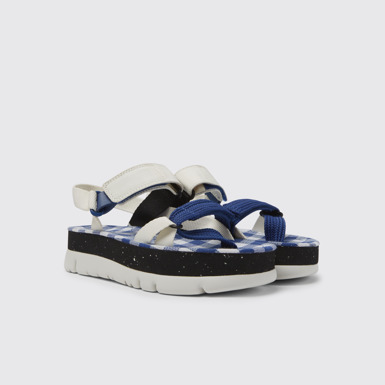 Front view of Oruga Up White, blue, and black sandals for women