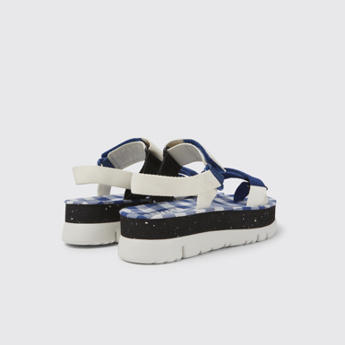 Back view of Oruga Up White, blue, and black sandals for women