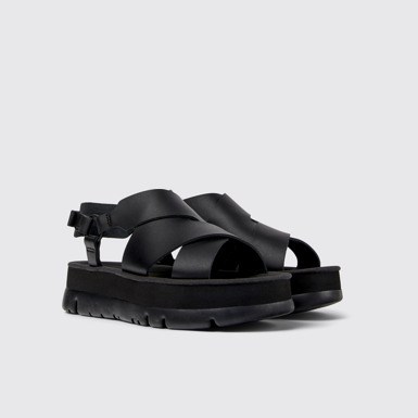 Front view of Oruga Up Black leather sandals for women