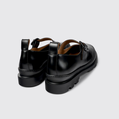 Back view of Brutus Black leather Mary Jane flats for women
