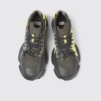 Overhead view of Twins Gray, yellow, and black leather sneakers for women