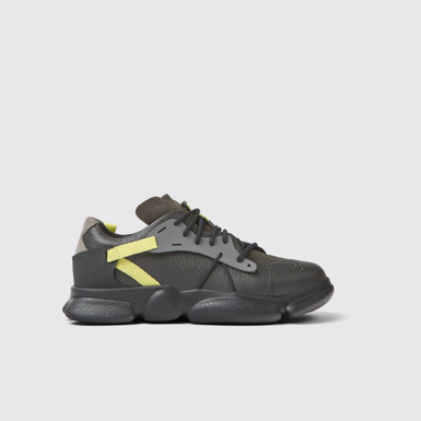 Side view of Twins Gray, yellow, and black leather sneakers for women