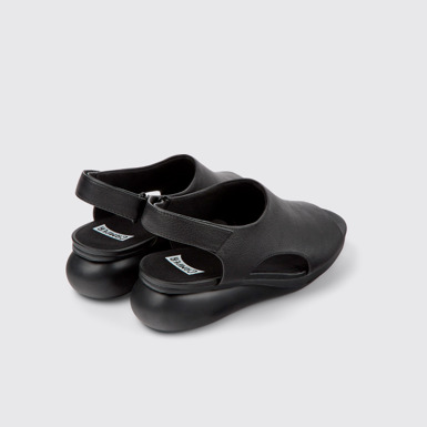Back view of Balloon Black leather sandals for women