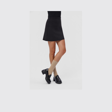 Thelma II Black Leather Moccasins for Women.