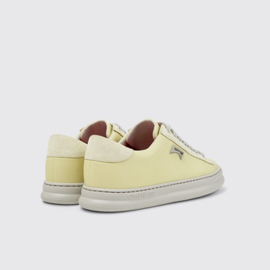 Runner 女裝黃色皮革和磨砂革運動鞋。