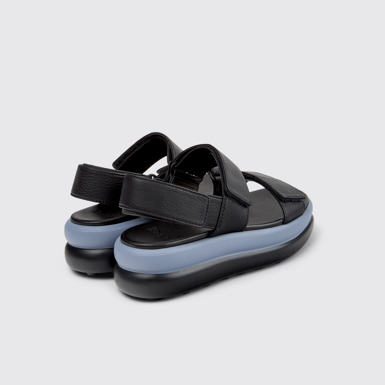 Pelotas Flota Up Sandalias de piel negras para mujer.