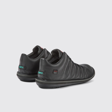 Back view of Beetle Black leather ankle boots for men