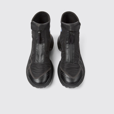 Overhead view of CRCLR Men's black ankle boots with ePE membrane