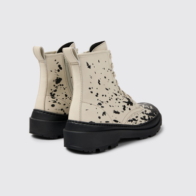 Back view of Brutus Trek White-black medium boots for men