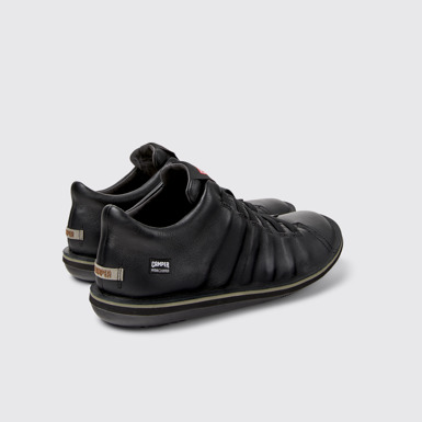 Back view of Beetle - HYDROSHIELD Black Leather Ankle Boots for Men.