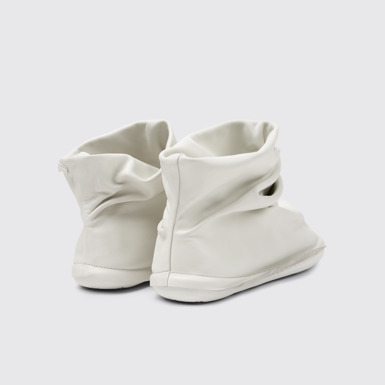 Back view of Camper x ISSEY MIYAKE - Peu Form White Leather Ankle Boots for Men.