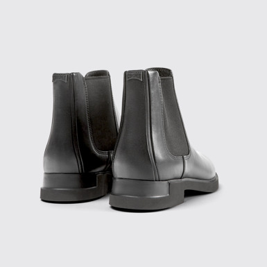 Back view of Iman Black Leather Ankle Boots for Women.