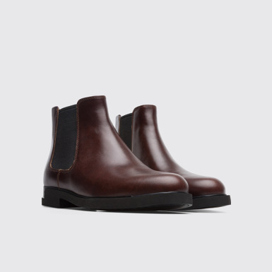 Front view of Iman Women's dark brown ankle boot